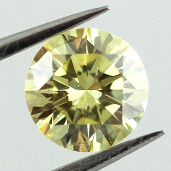 Fancy Intense Greenish Yellow Diamond, Round, 0.58 carat, SI2 - B