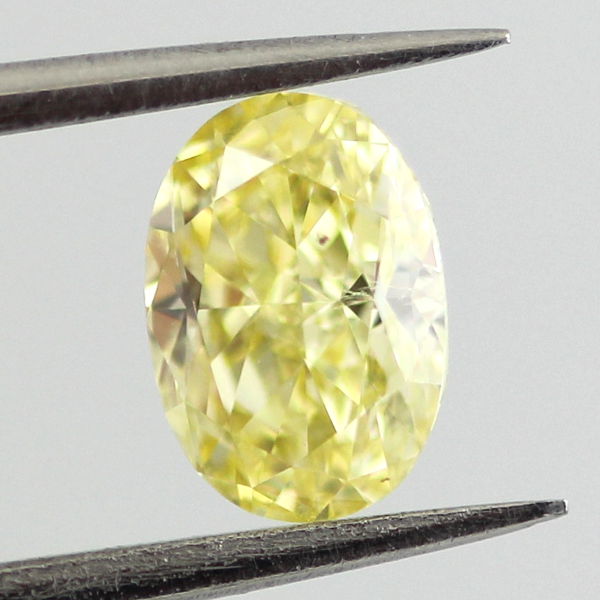 Fancy Intense Yellow Diamond, Oval, 0.71 carat, SI1 - B