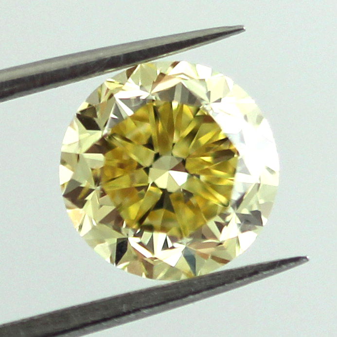 Fancy Vivid Yellow Diamond, Round, 1.69 carat, SI2 - B