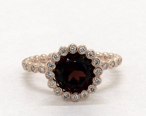 14k Rose Gold Garnet and Diamond Studded Braded Halo Ring