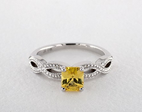 emerald cut vintage yellow sapphire engagement ring