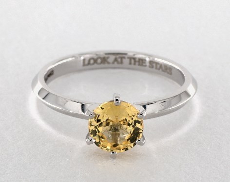 solitaire yellow sapphire engagement ring in white gold