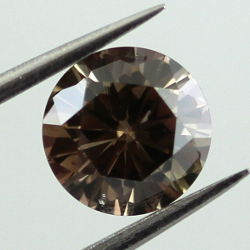 Fancy Dark Brown, 0.87 carat, I1