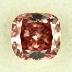 Fancy Intense Orangy Pink, 0.62 carat, VS2