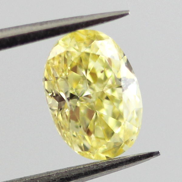 Fancy Intense Yellow Diamond, Oval, 0.71 carat, SI1