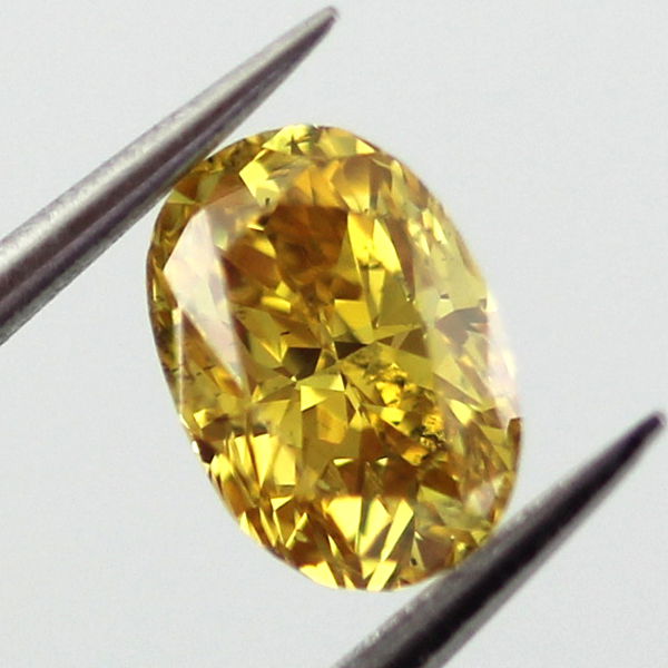 Fancy Vivid Orangy Yellow Diamond, Oval, 0.56 carat - B