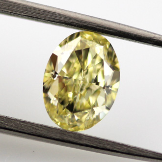 Fancy Yellow, 0.90 carat, VS1