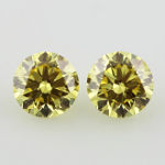 Pair of Fancy Intense Yellow, 3.35ct, SI1