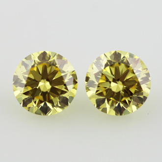 Pair of Fancy Intense Yellow Diamond, Round, 3.35 carat, SI1