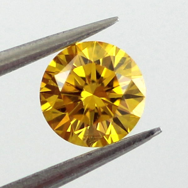 Pair of Fancy Vivid Orangy Yellow Diamond, Round, 0.60 carat, SI2 - B