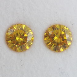 Pair of Fancy Vivid Orangy Yellow Diamond, Round, 0.60 carat, SI2 - Thumbnail