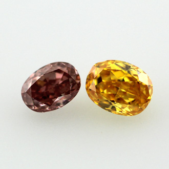 Pair of Vivid Yellow Orange and Deep Orangy Pink Diamond, Oval, 0.51 carat, SI1 - B